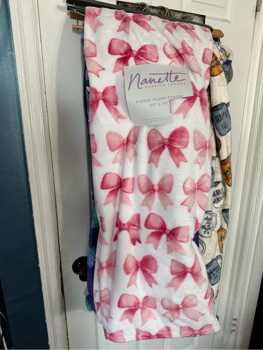 Nanette Lepore Fleece Throw with Pink Bow Print. 50x70